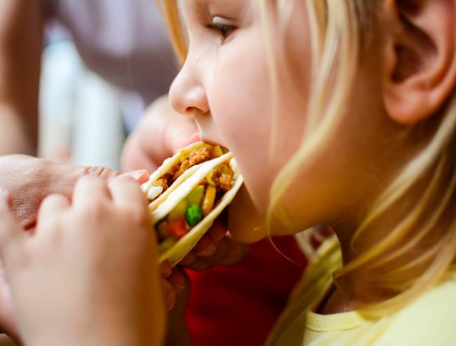 child eating mild Mexican food
