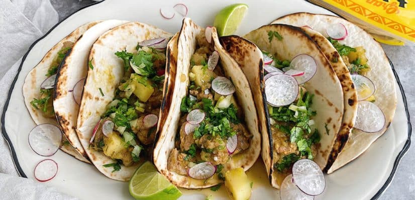 Pork in salsa verde with soft tacos